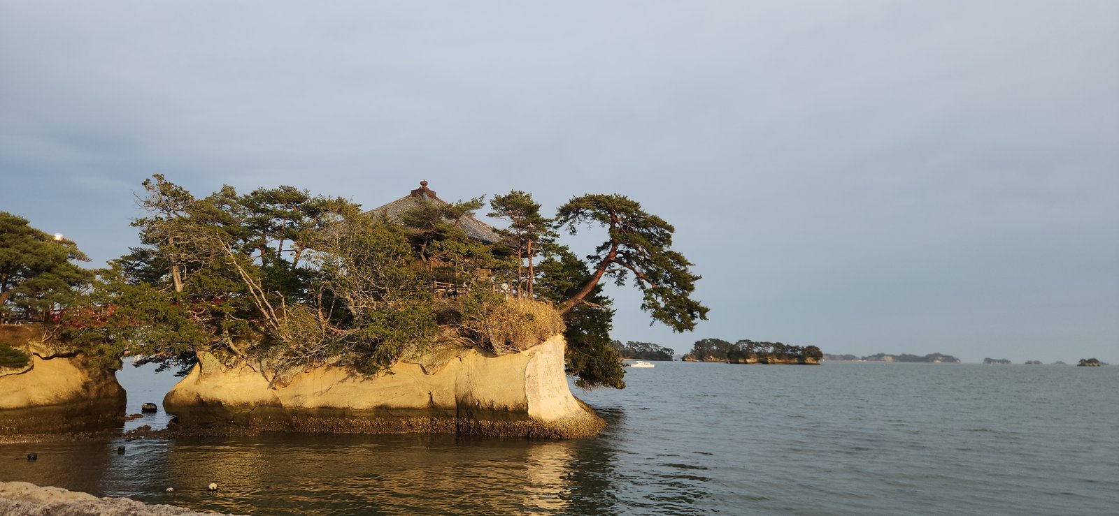 Matsushima sightseeing boat cruise near pine-covered islands