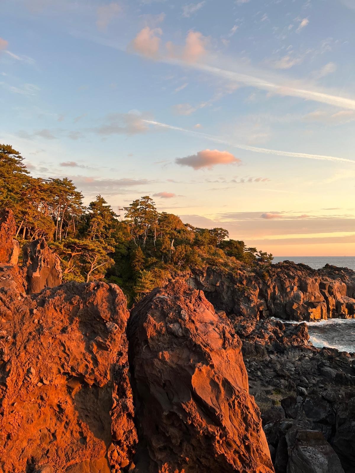 Sunrise lighting up the rocky coastline near Ito on the Izu Peninsula